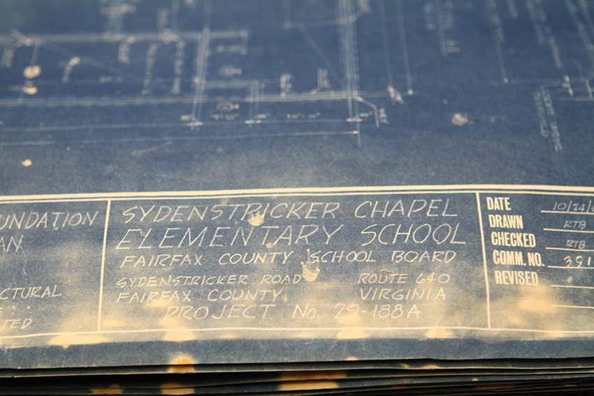 Photograph of a page of the original blueprints for Hunt Valley Elementary School.